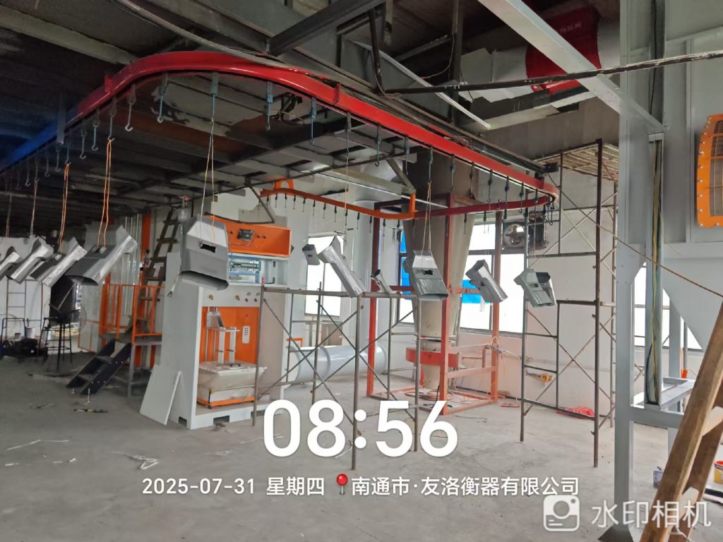 江海之畔安裝忙:新月電子儀器自動(dòng)噴粉線設(shè)備落戶南通